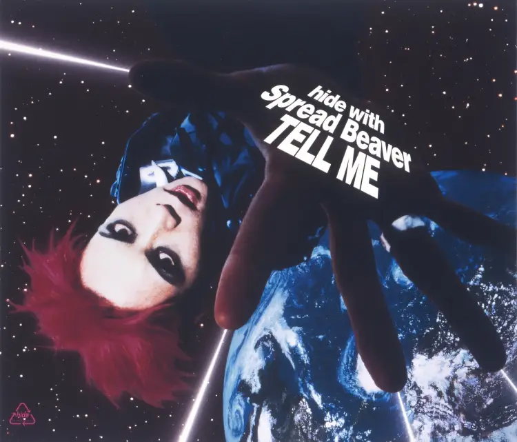 Portada del álbum TELL ME