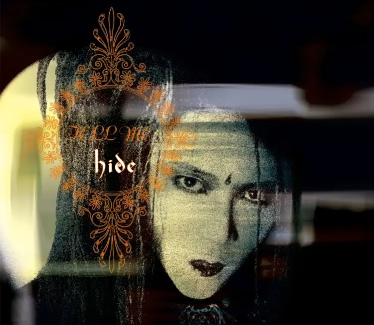 Portada del álbum TELL ME